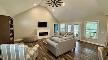TV, fireplace, books