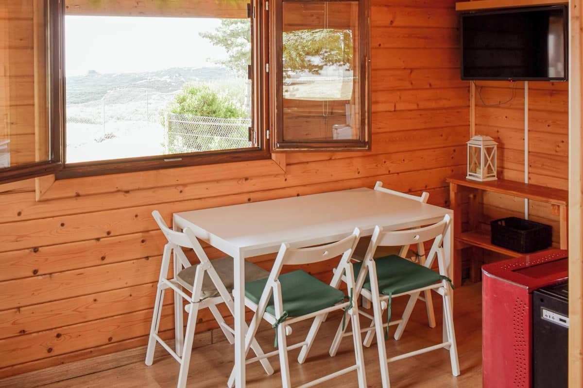 Desk, laptop workspace, free WiFi, bed sheets