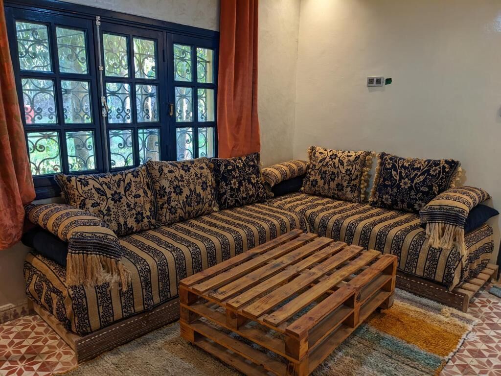 Chambre Familiale, vue jardin | Coin séjour