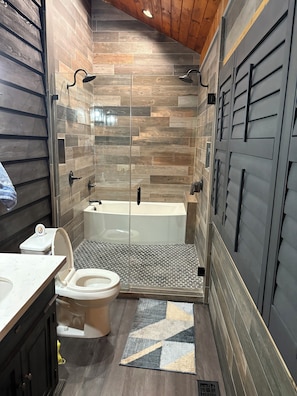 Shower, towels, toilet paper
