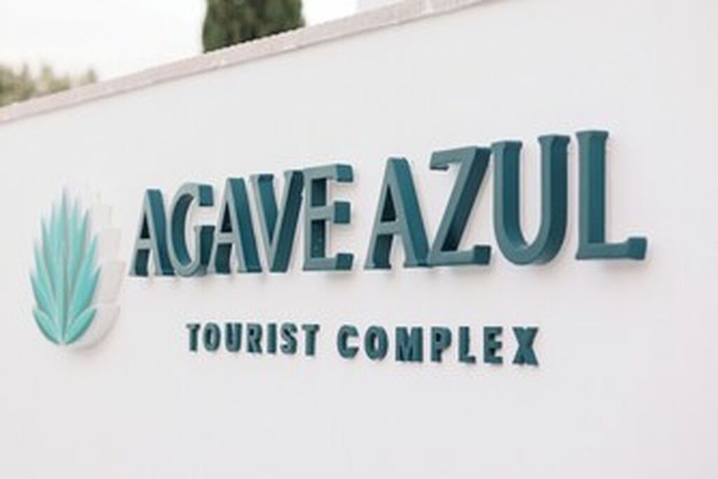 A sign for the Agave Azul Tourist Complex.