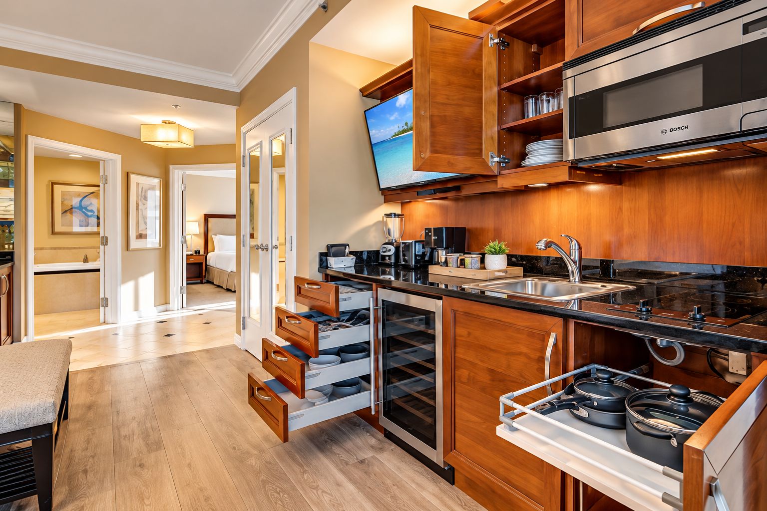 A modern kitchen with wooden cabinets, a Bosch microwave, and a built-in oven.