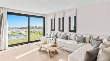 Luxury Villa, Private Pool, Sea View | Living area | 43-inch Smart TV with cable channels