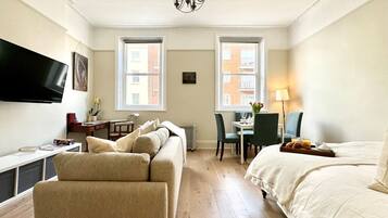 1 bedroom, desk, iron/ironing board, travel cot