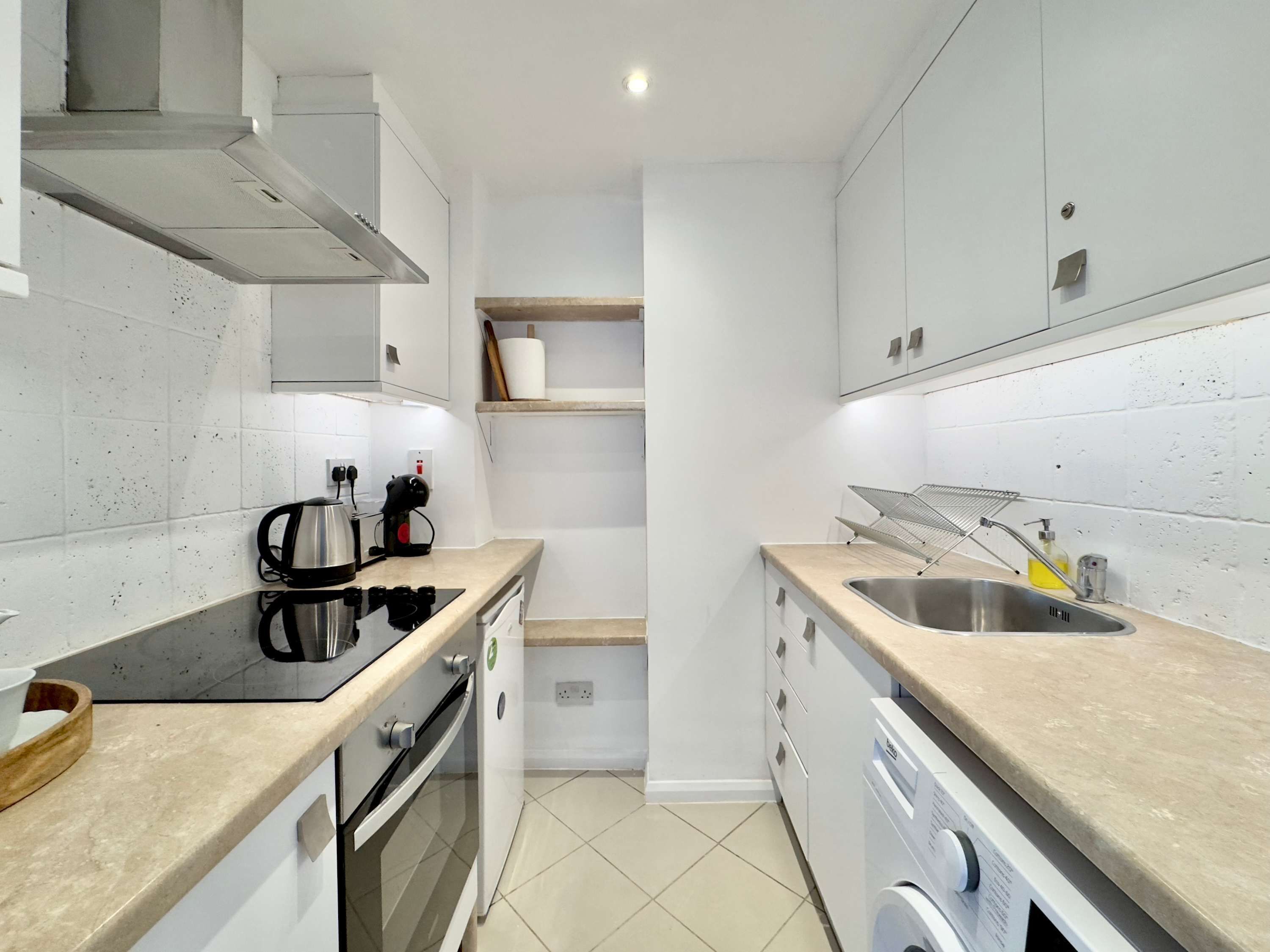 Coffee/tea maker, fridge, microwave, oven