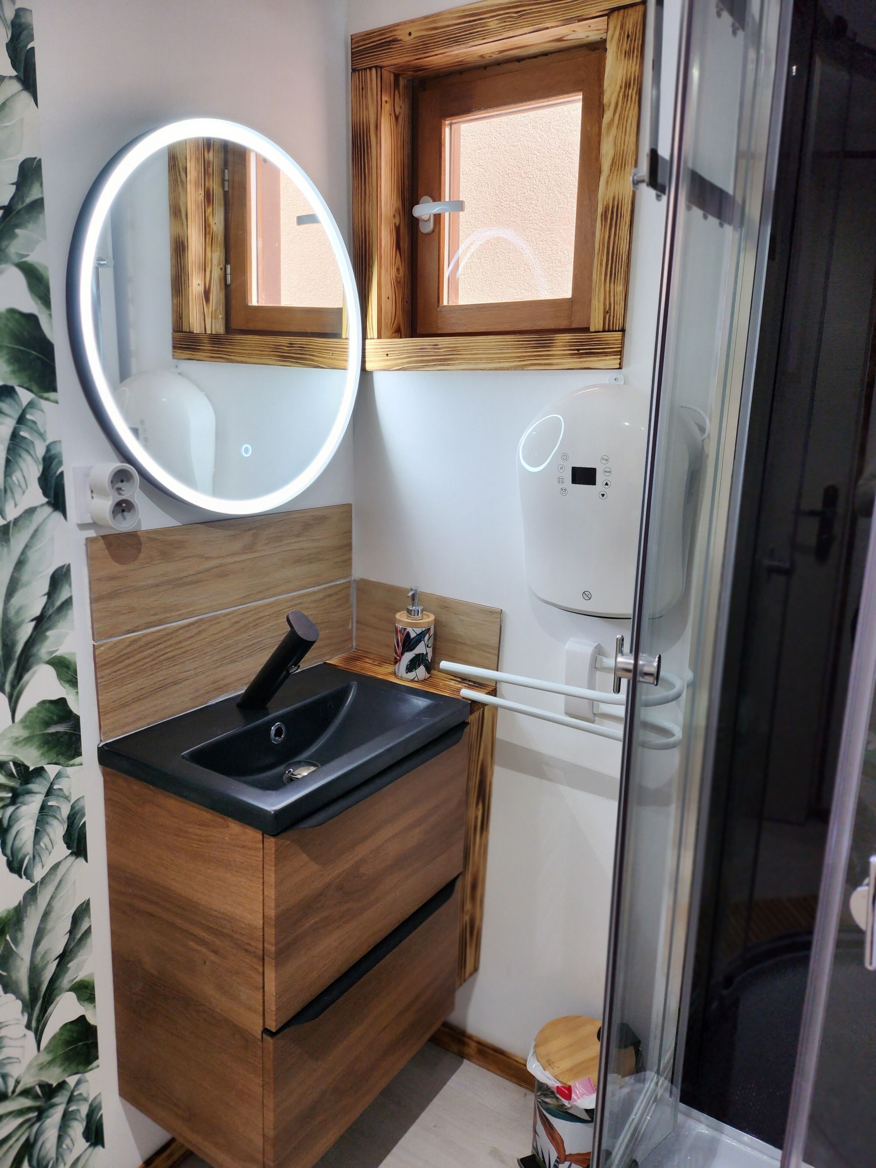 Shower, hair dryer, towels, toilet paper