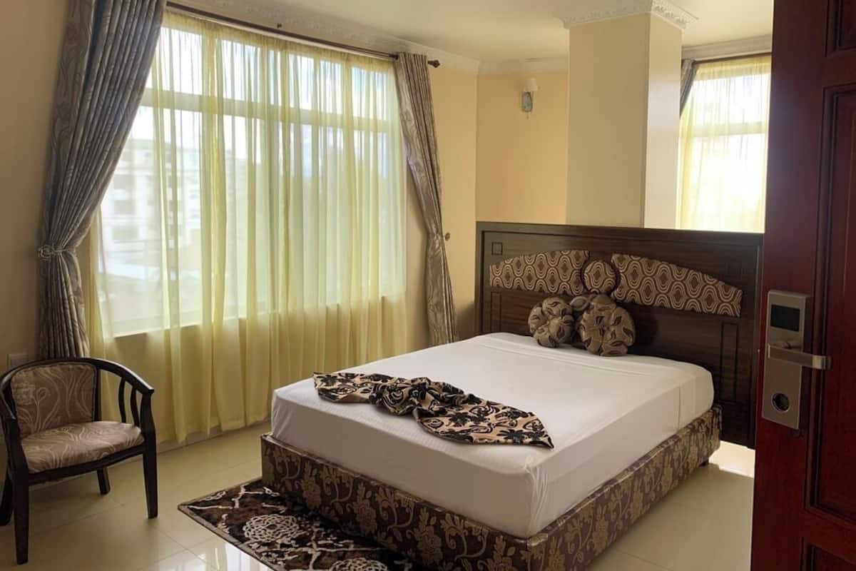 Minibar, desk, laptop workspace, blackout curtains
