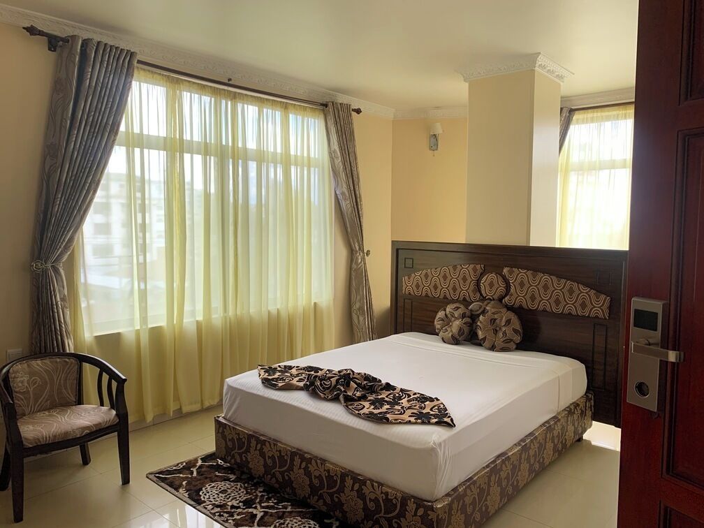 Minibar, desk, laptop workspace, blackout curtains