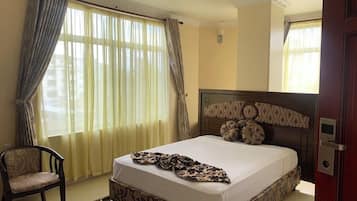 Minibar, desk, laptop workspace, blackout curtains