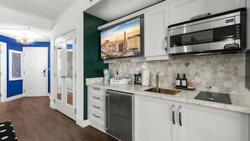 Microwave, stovetop, coffee/tea maker, toaster