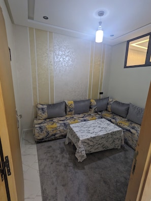 Living area - 2-bedroom apartment in tranquil Meknès with cool AC comfort (Meknès)