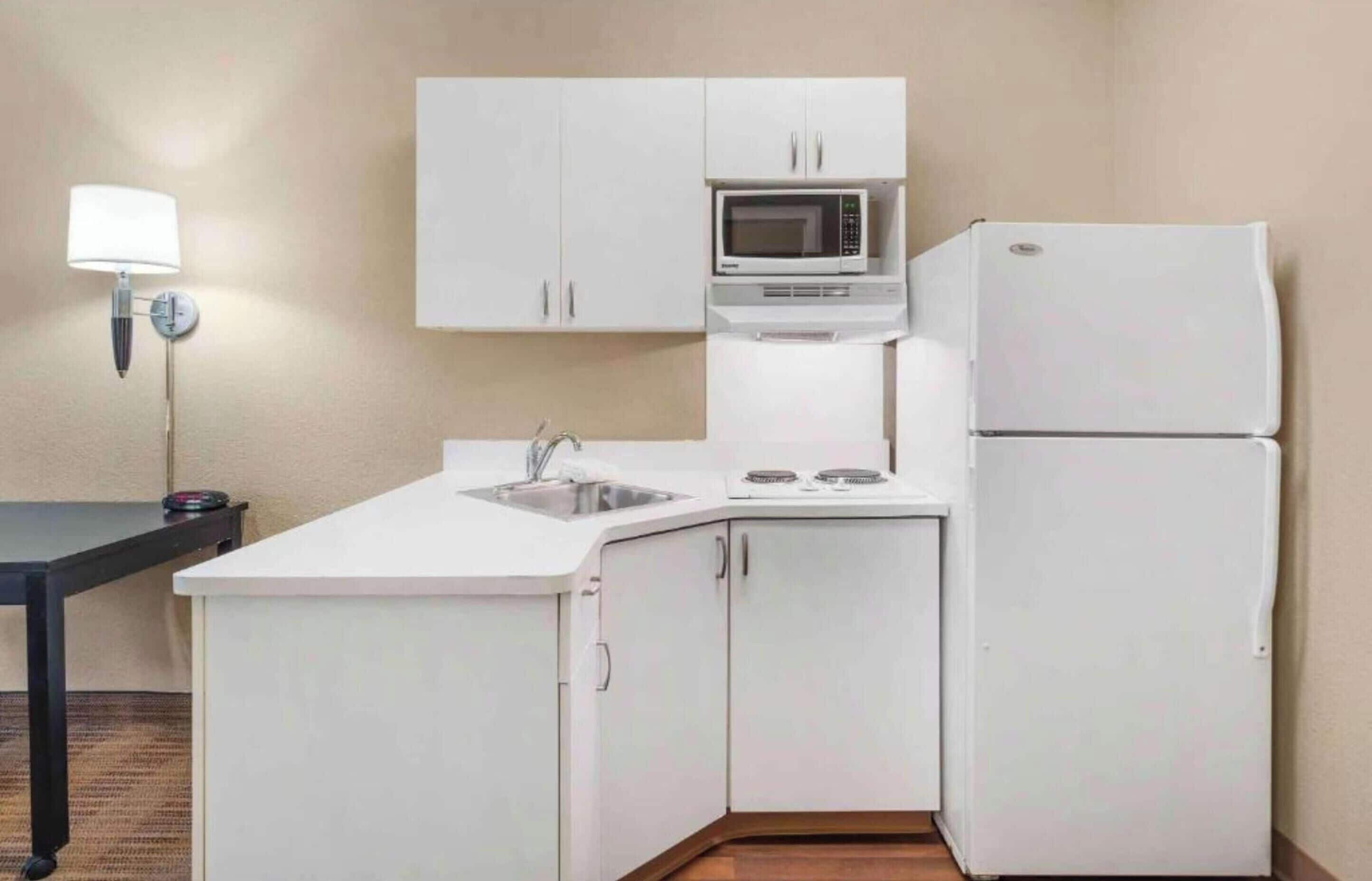 Full-size fridge, microwave, stovetop