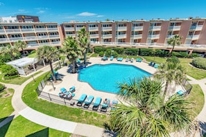 Outdoor pool, a heated pool - Beach front pool side resort condominium in Galveston Texas. Great view of Gulf. (Galveston)