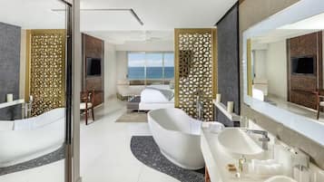 Separate bathtub and shower, hair dryer, towels, soap