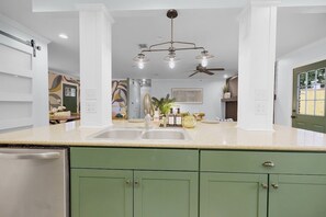 Designed for both ease and connection, this open-concept kitchen is truly the heart of the home. - 5 Bed*Pet Friendly*Cowboy Pool (Savannah)