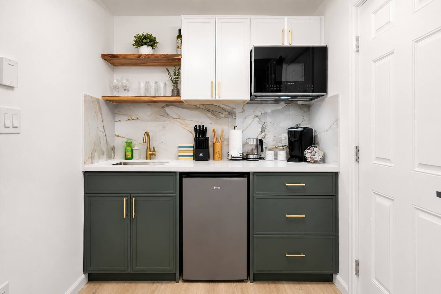 Microwave, stovetop, coffee/tea maker, dining tables