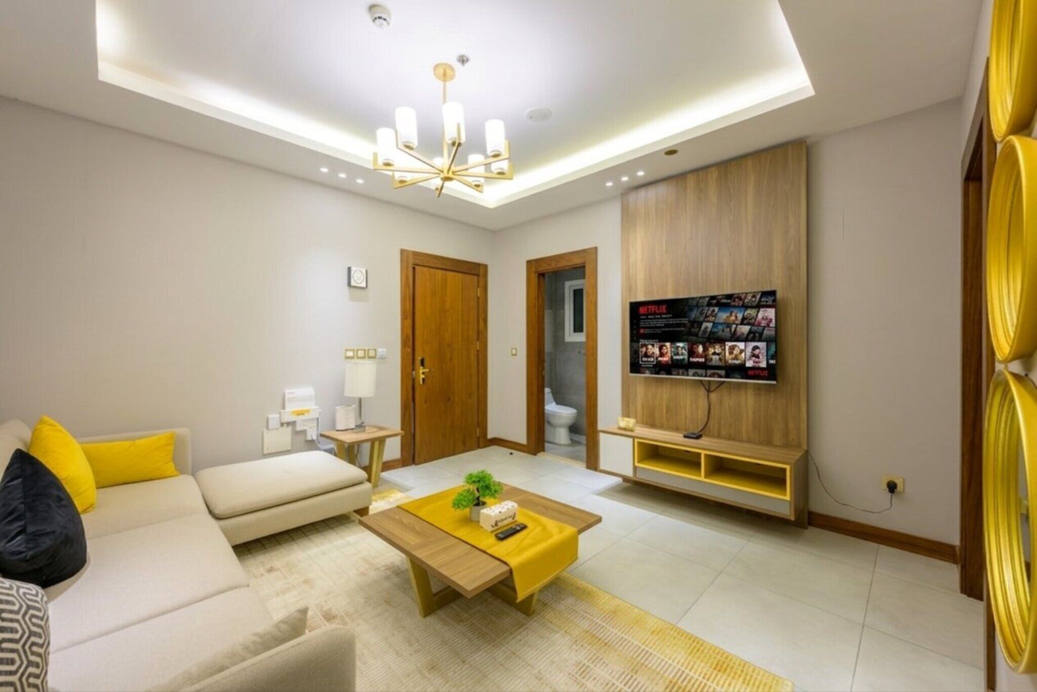 Deluxe Suite, City View | Living area | Smart TV, streaming services, computer monitors, printers