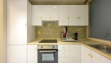 Luxury Suite, Balcony, City View | Private kitchen