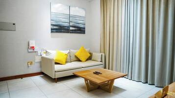 Executive Suite, City View | Living area | Smart TV, streaming services, computer monitors, printers