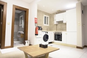 Suíte luxo, vista para a cidade | Cozinha privada