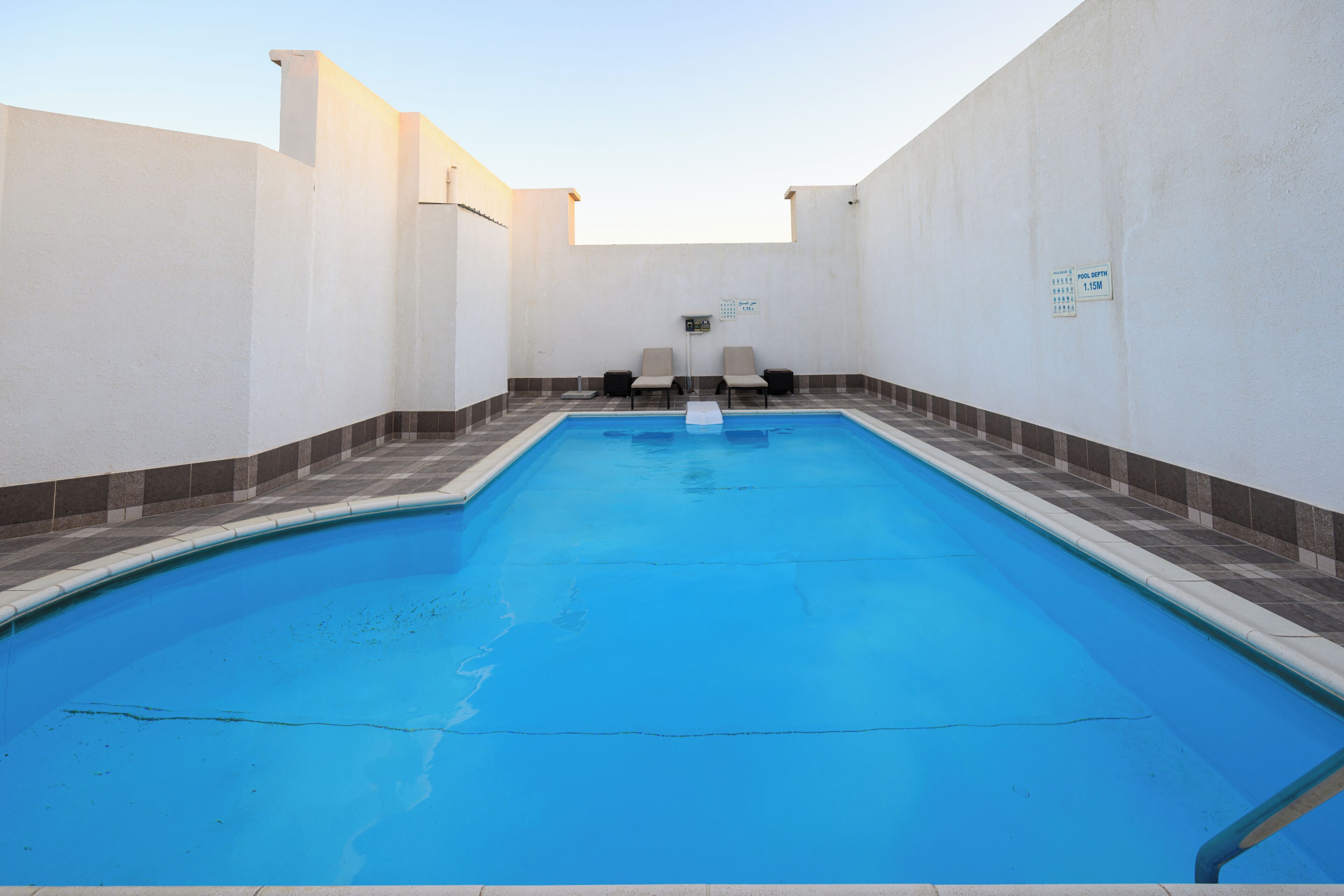 Outdoor pool, pool umbrellas, pool loungers