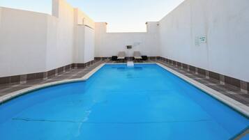 Outdoor pool, pool umbrellas, pool loungers