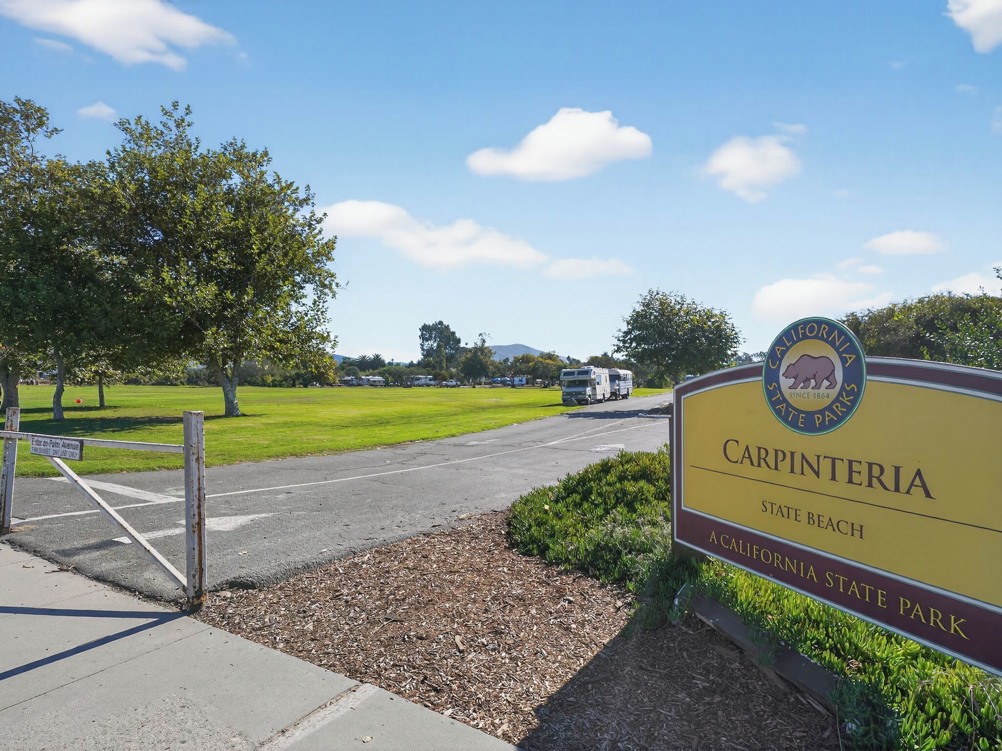 A sign for Carpinteria State Beach in California State Parks.