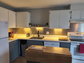 Private kitchen - Vibrant family run 2-bedroom condo in Columbia Falls (Columbia Falls)