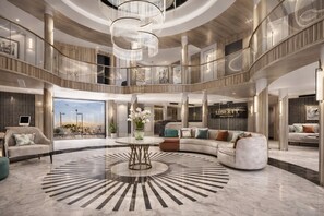 A spacious lobby with a central round table, a sofa set, and a chandelier. - 4 nights Elegant Nile Cruise full board (Luxor)