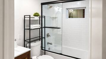 Shower, hair dryer, towels, soap