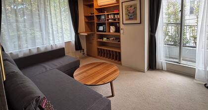 Cozy 2 bedrooms in central Tokyo with private bath and living room.