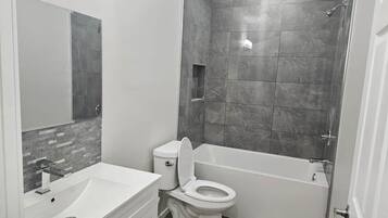 Hair dryer, towels, soap, shampoo