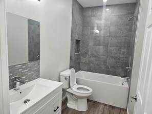 Hair dryer, towels, soap, shampoo - Modern 2-Bedroom Private Basement Apartment (Airdrie)