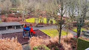 A park with a playground, benches, and a pathway. - 4-guest Elegant Holiday Base in Hotton (Hotton)
