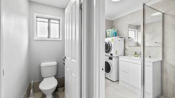 Shower, hair dryer, towels, soap