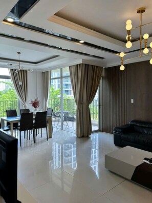 Deluxe Duplex, City View | Living area - Lumiere Home 3BR - Just 5 Mins to SECC (Ho Chi Minh City)
