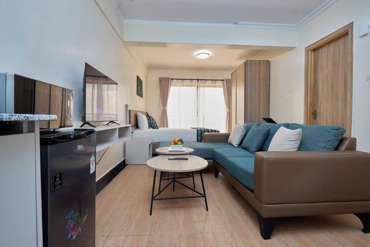 Estudio Deluxe | Ropa de cama de alta calidad y caja de seguridad en la habitación