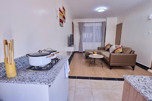 Departamento ejecutivo, 1 habitación | Área de sala de estar