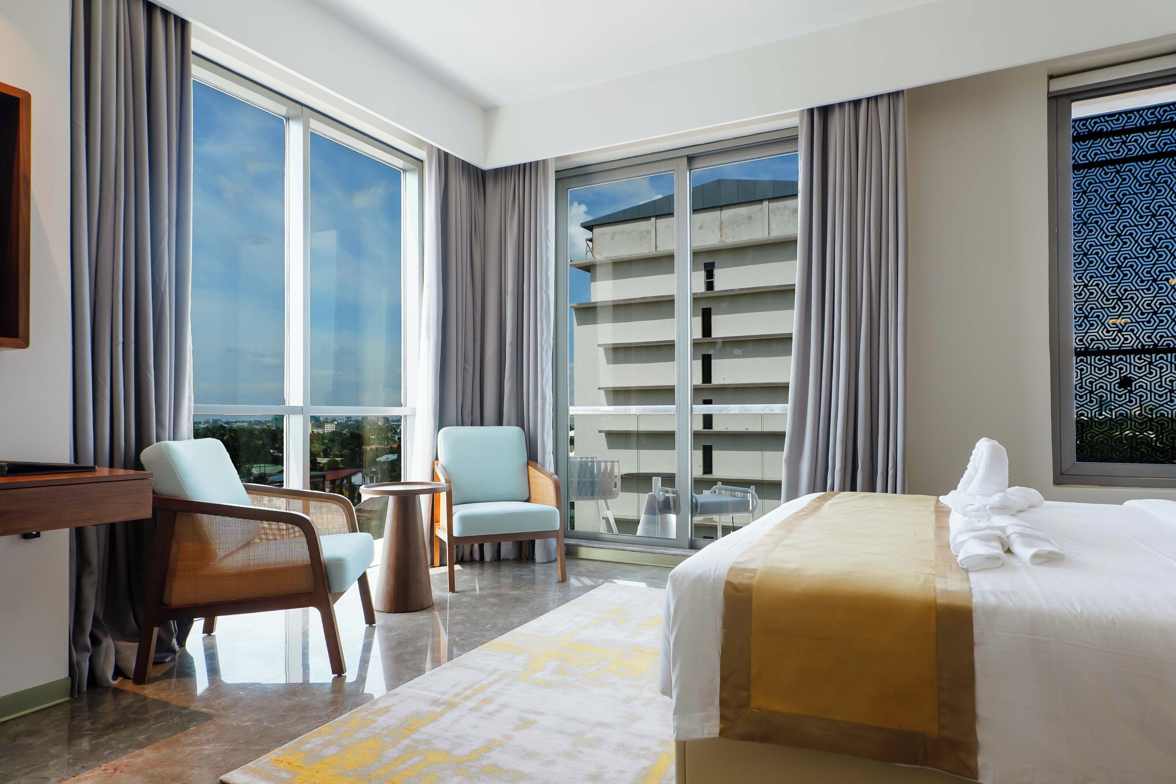 Superior Suite, Balcony, Partial Sea View | In-room safe, blackout curtains, free WiFi