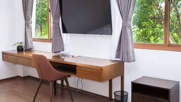 Quarto casal luxo, vista para o jardim | Parte interna