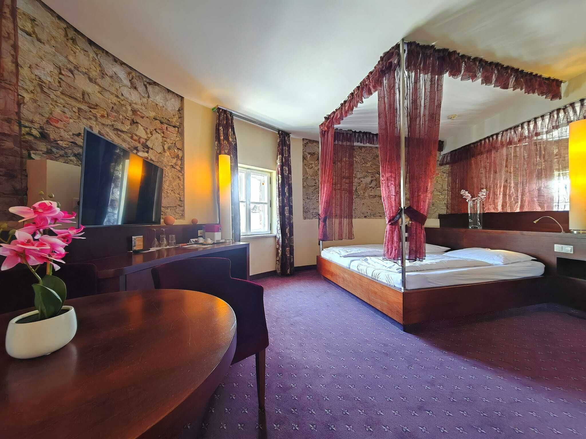 Family Suite, City View | In-room safe, desk, blackout curtains, iron/ironing board