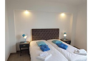2 chambres, fer et planche à repasser, Wi-Fi, draps fournis