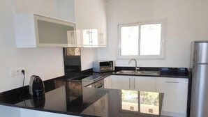 Private kitchen - Lésia Residence: Lisa Apartment - Ocean View (Corbara)