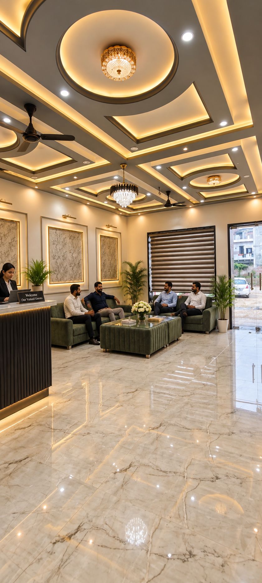 Un área de recepción moderna con piso de mármol, un mostrador de recepción, arreglos de asientos e iluminación decorativa.