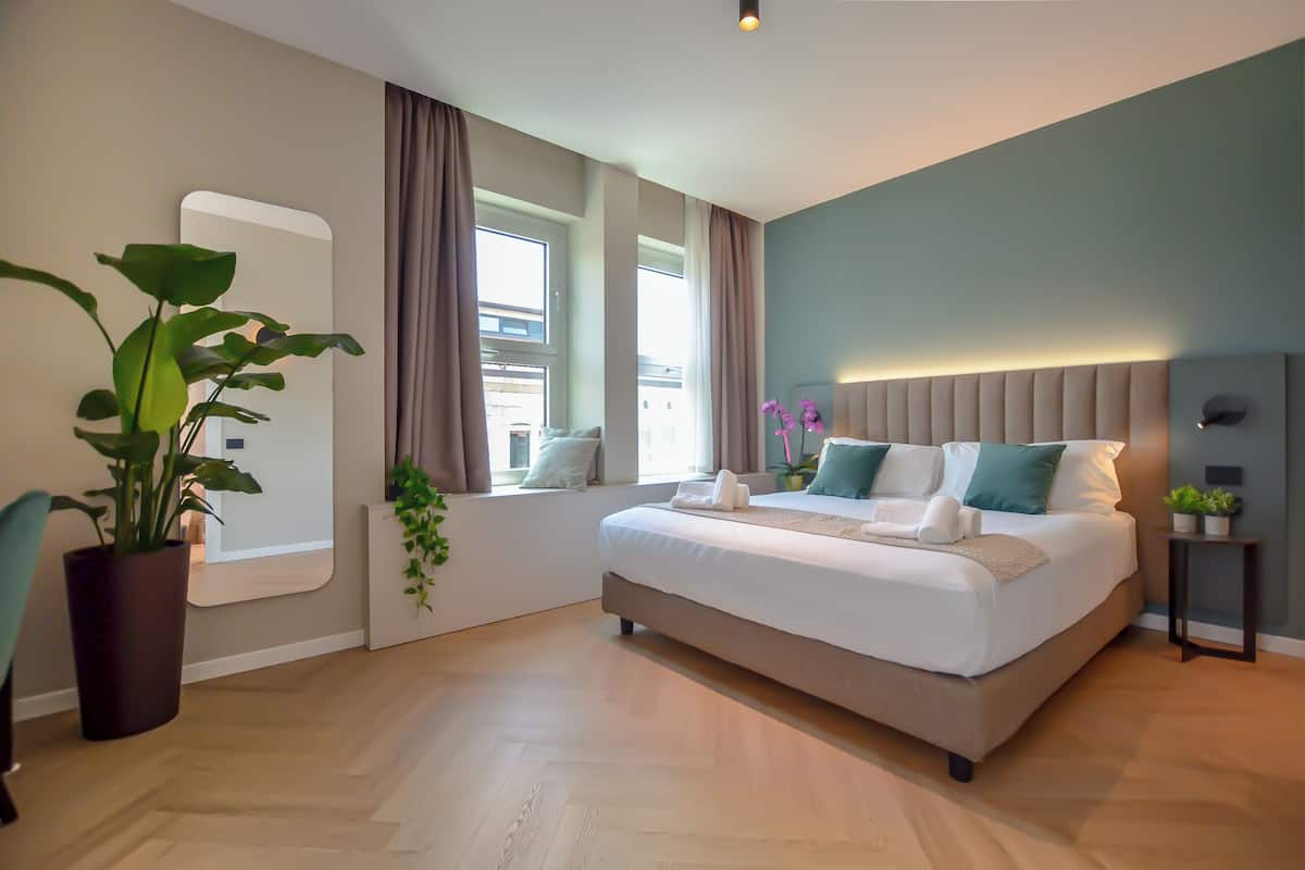 Comfort Double Room, City View | Down comforters, in-room safe, desk, blackout drapes