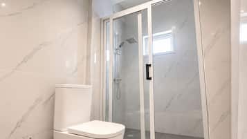 Shower, towels, soap, shampoo