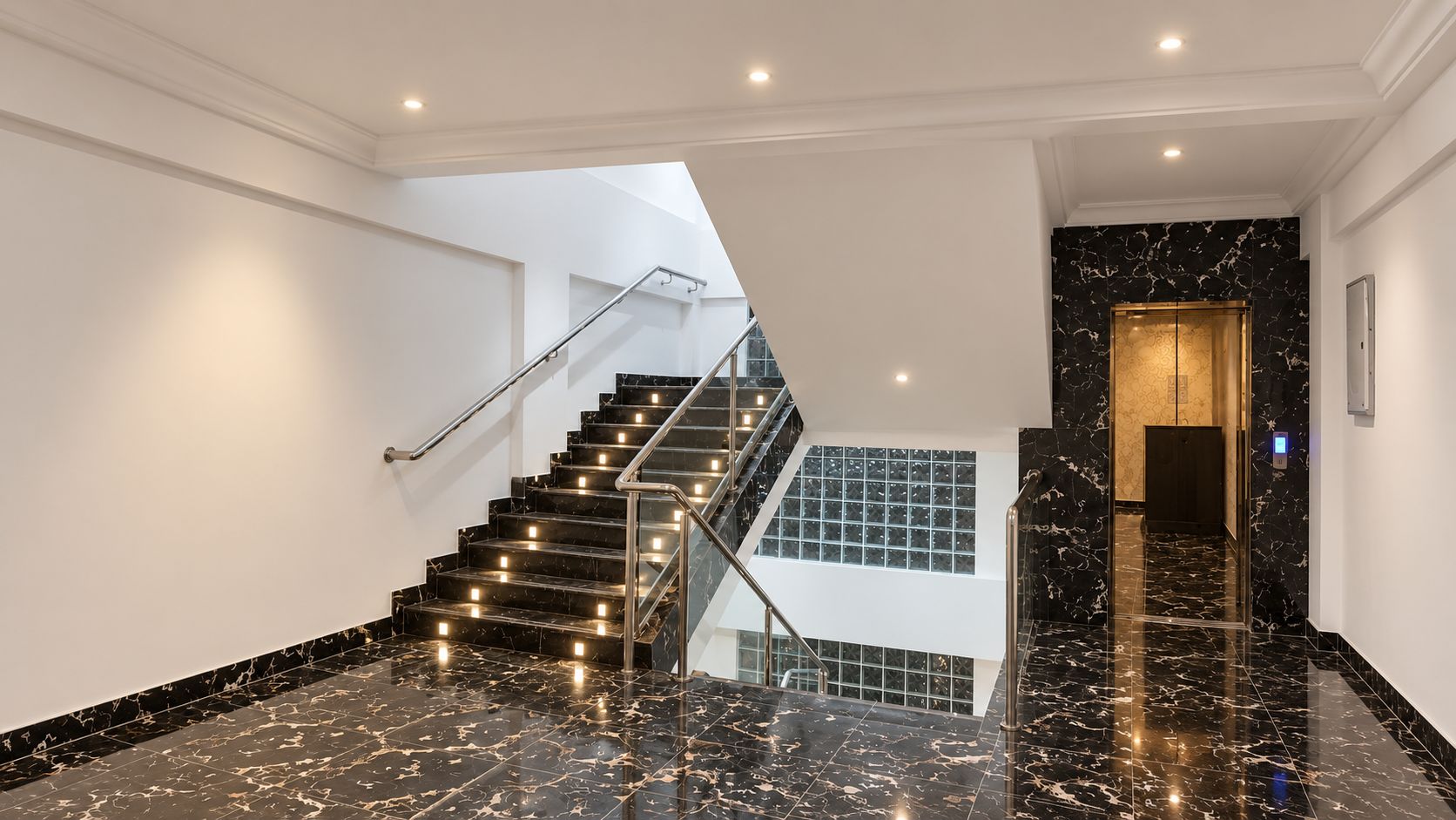 A modern interior with a staircase, marble flooring, and a glass elevator.