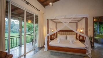 Deluxe Villa, 2 Bedrooms, Garden Area | Pillow-top beds, laptop workspace, iron/ironing board, free WiFi