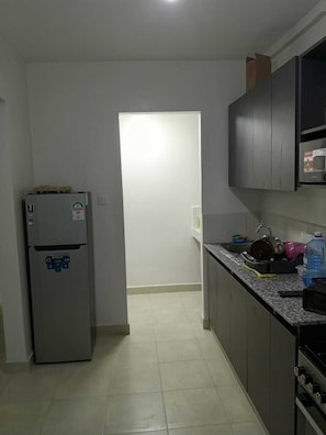 Private kitchen - Cozy Apartment in Garden city Mall close to CBD (Nairobi)