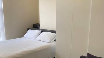 2 habitaciones, tabla de planchar con plancha y wifi gratis